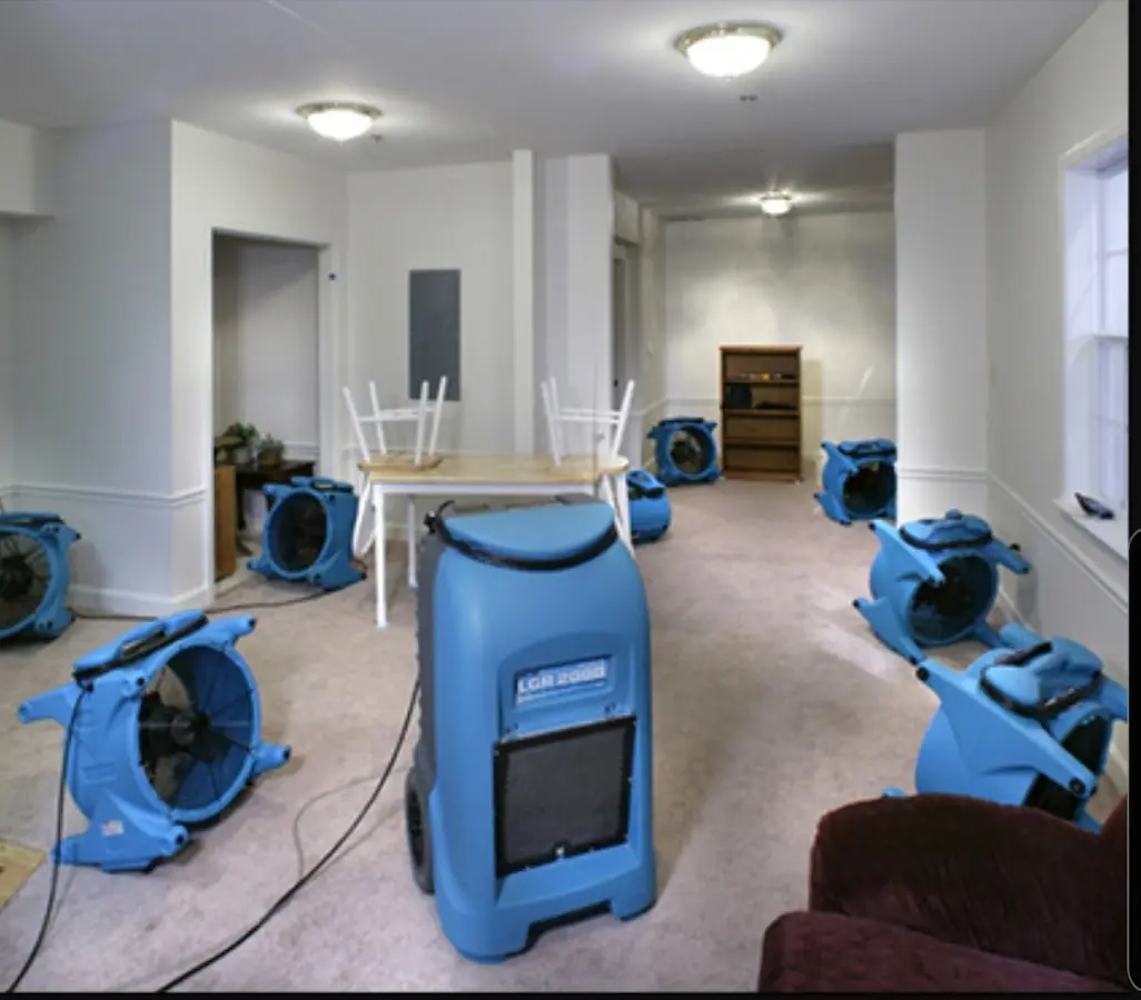 Air movers and dehumidifier setup for Water Damage Restoration in Hitchcock
